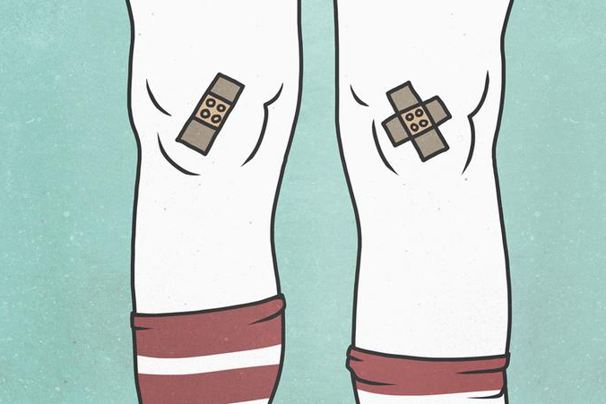 A cartoon drawing of knees covered in band-aids, with striped knee socks